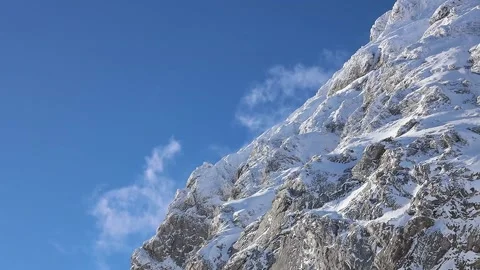 Clouds beyond mountain summit Stock Footage 239340732