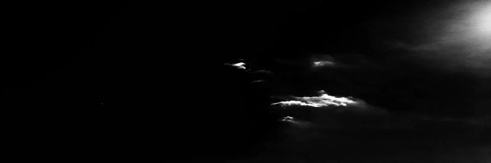 Clouds. Black Background. Isolated white clouds on black sky. Set of isolated Stock-Fotos