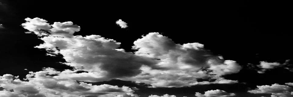 Clouds. Black Background. Isolated white clouds on black sky. Set of isolated Stock-Fotos