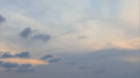 The clouds of black rain move slowly in the sun near the ground.Time Lapse 库存影片 104588240
