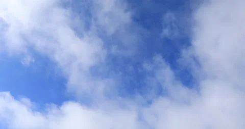 Clouds blowing in blue sky ,fast motion Stock Footage 133283007