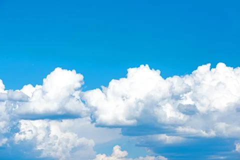 Clouds on blue azure sky bright daytime summer. Everything lies above surface Stock Photos