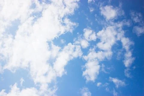 Clouds on a blue background Stock Photos