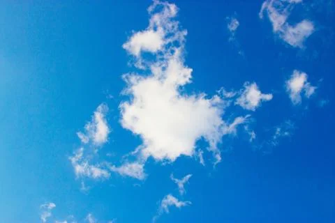 Clouds on a blue background Stock Photos