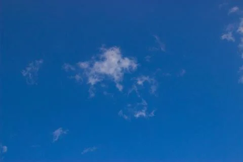 Clouds on a blue background Stock Photos