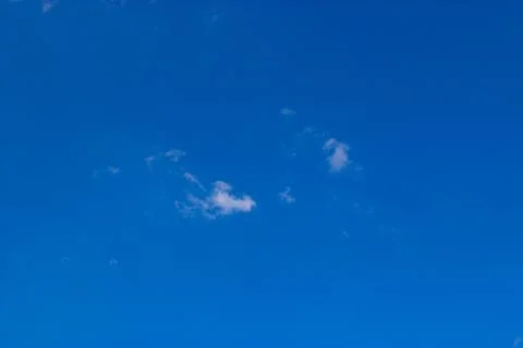 Clouds on a blue background Stock Photos