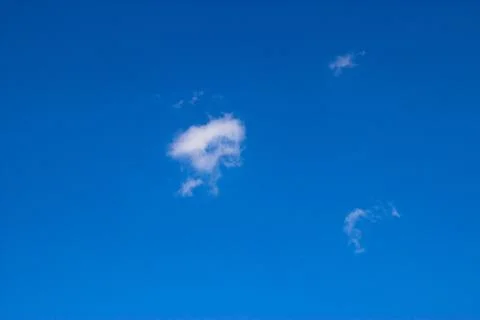 Clouds on a blue background Stock Photos