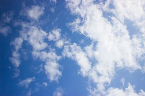 Clouds on a blue background Stock Photos