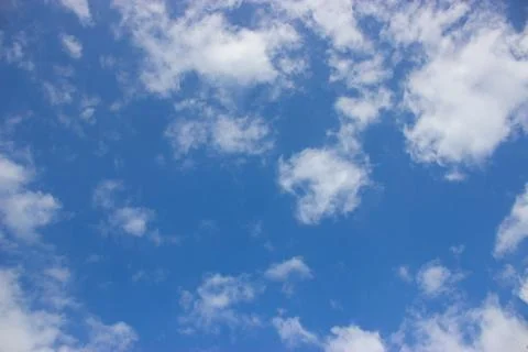 Clouds on a blue background Stock Photos