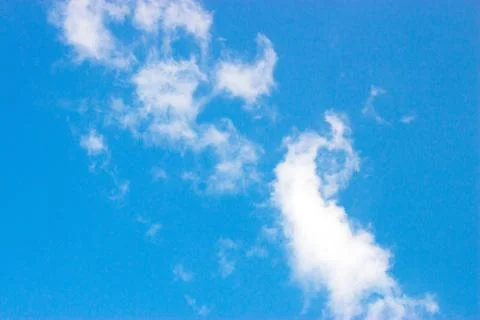 Clouds on a blue background Stock Photos