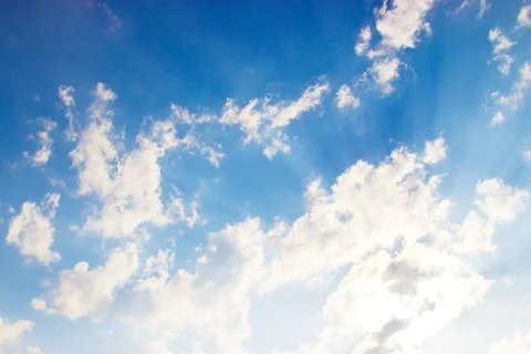 Clouds on a blue background Stock Photos