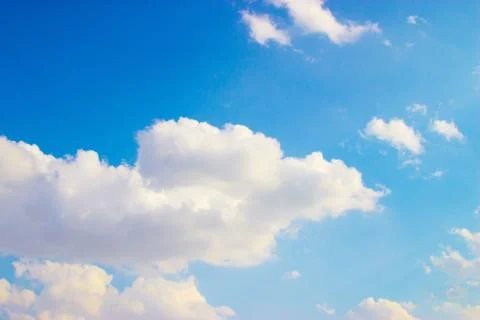 Clouds on a blue background Stock Photos