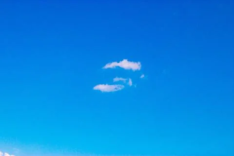 Clouds on a blue background Stock Photos