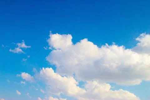 Clouds on a blue background Stock Photos