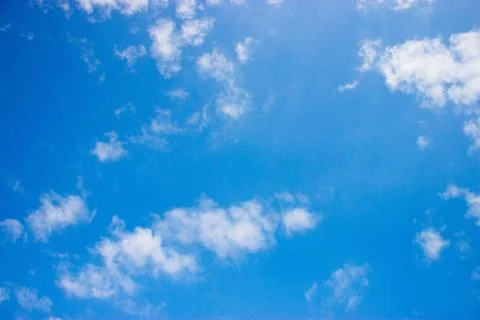 Clouds on a blue background Stock Photos