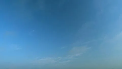 Clouds with blue light blue sky in horizon. No birds and free of defects Stock Photos