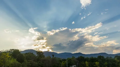 Clouds on blue sky and sun ray Stock Footage 64171578
