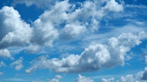 Clouds on blue sky background on Milano city. Cumulonimbus Stock Photos