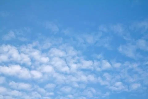 Clouds in blue sky as a background Stock Photos