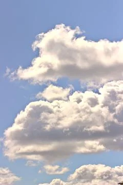 Clouds in the blue sky as a background Stock Photos