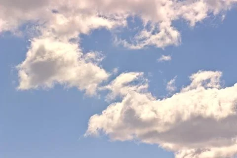 Clouds in the blue sky as a background Stock Photos
