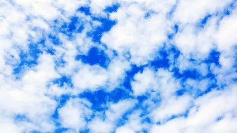 Clouds on the blue sky for a background. Stock Photos