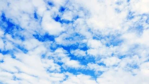 Clouds on the blue sky for a background. Stock Photos