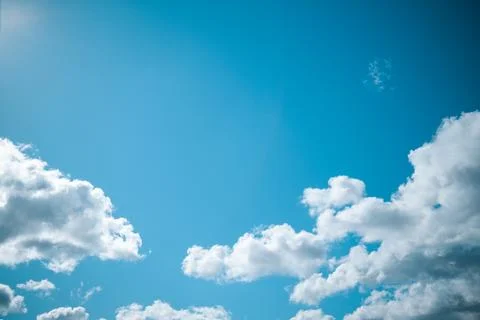 Clouds in the blue sky as a background Stock Photos
