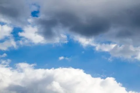 Clouds in the blue sky. A beautiful clouds against the blue sky background. B Stock Photos