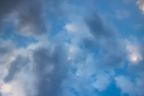 Clouds in the blue sky. A beautiful clouds against the blue sky background. B Stock Photos