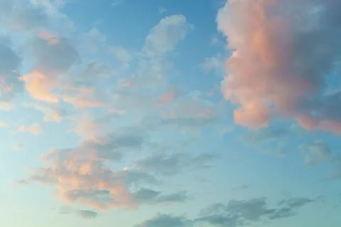 Clouds in the blue sky at dawn Stock Photos