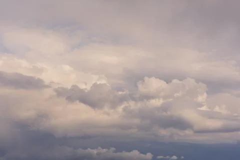 Clouds in the blue sky indicate the arrival of a disturbance Stock Photos