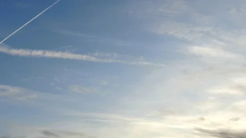 Clouds in the blue Sky - old style time lapse Stock Footage 118237317