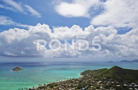 Clouds in blue sky over islands, Hawaii, United States Stock Photos