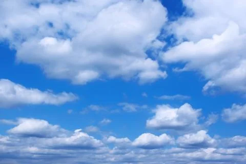 Clouds in a blue sky Stock Photos