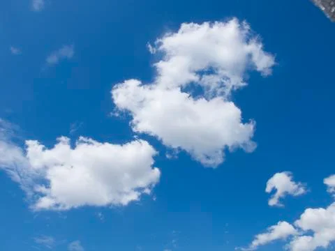 Clouds in a blue sky Stock Photos