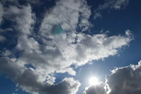 Clouds on a blue sky Stock Photos