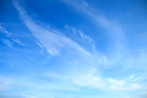 Clouds in a blue sky Stock Photos