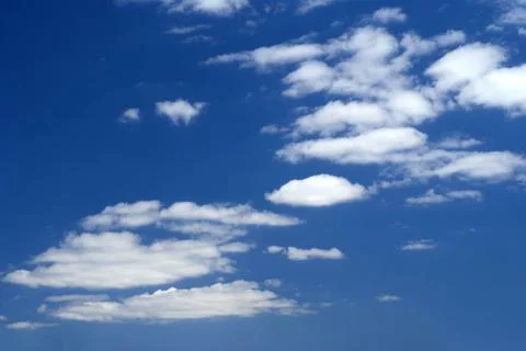 Clouds on blue sky Stock Photos