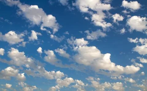 Clouds in the blue sky. Stock Photos