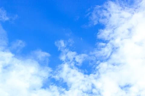 Clouds on the blue sky Stock Photos