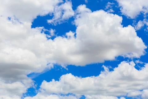 Clouds on the blue sky Stock Photos