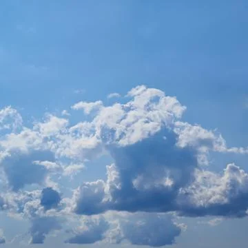 Clouds on the blue sky Stock Photos