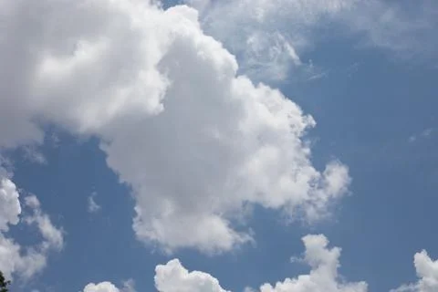 Clouds in a blue sky Stock Photos