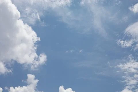Clouds in a blue sky Stock Photos