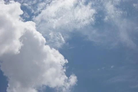 Clouds in a blue sky Stock Photos