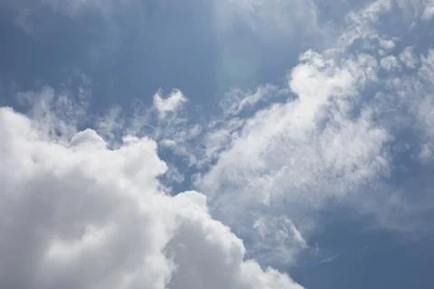 Clouds in a blue sky Stock Photos