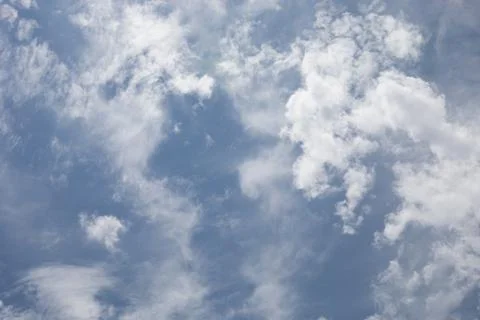 Clouds in a blue sky Stock Photos