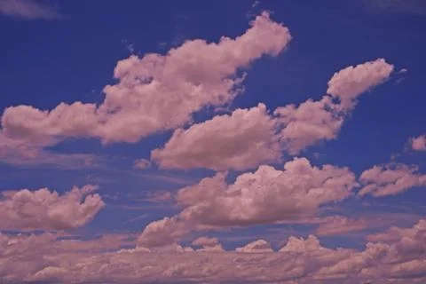 Clouds in the blue sky Stock Photos