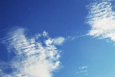 Clouds on the blue sky. Stock Photos
